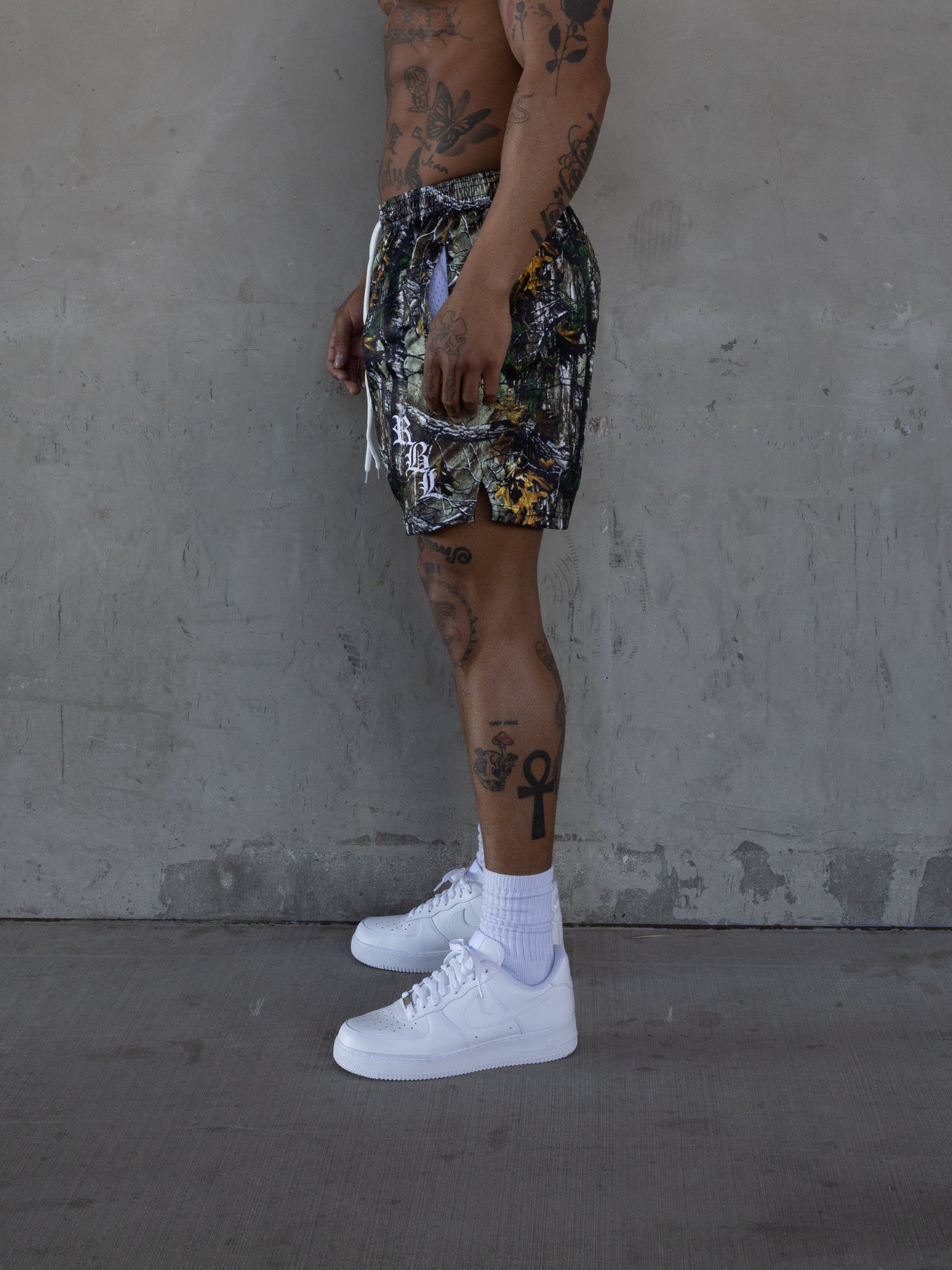 REBELETICS " RBL " TREE CAMO MESH SHORTS