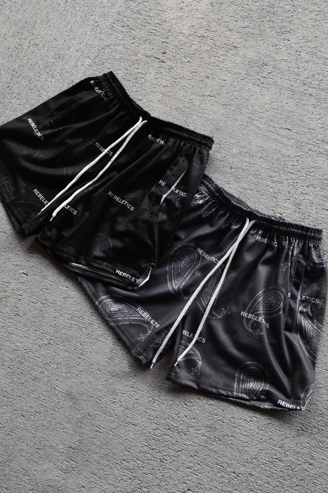REBELETICS DISTRESSED PAISLEY MESH SHORTS - BLACK