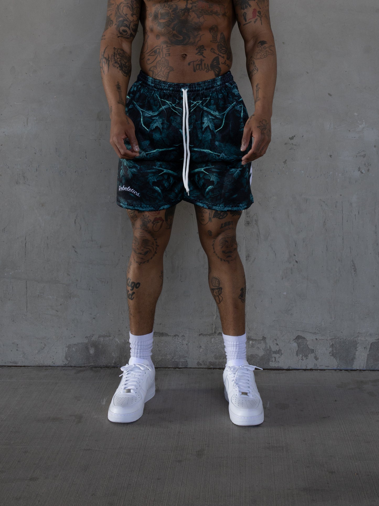 REBELETICS WHITE FLAME TREE CAMO MESH SHORTS - EMERALD GREEN