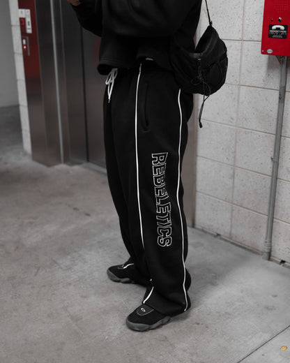 REBELETICS BAGGY SWEATPANTS - BLACK