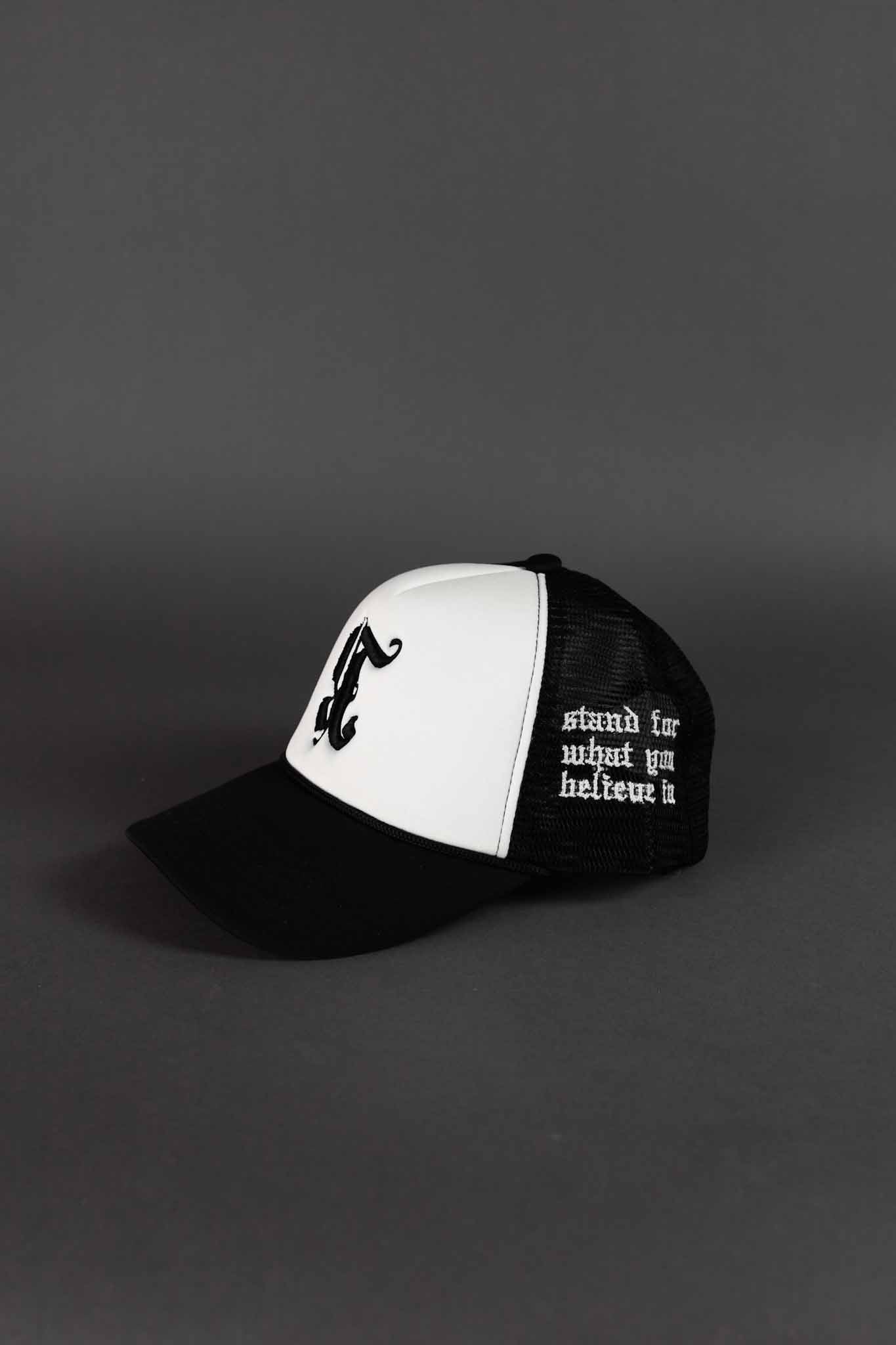 REBELETICS REVERSED "R" TRUCKER HAT - BLACK/WHITE
