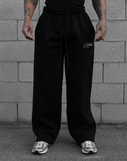 REBELETICS BAGGY SWEATPANTS - BLACK